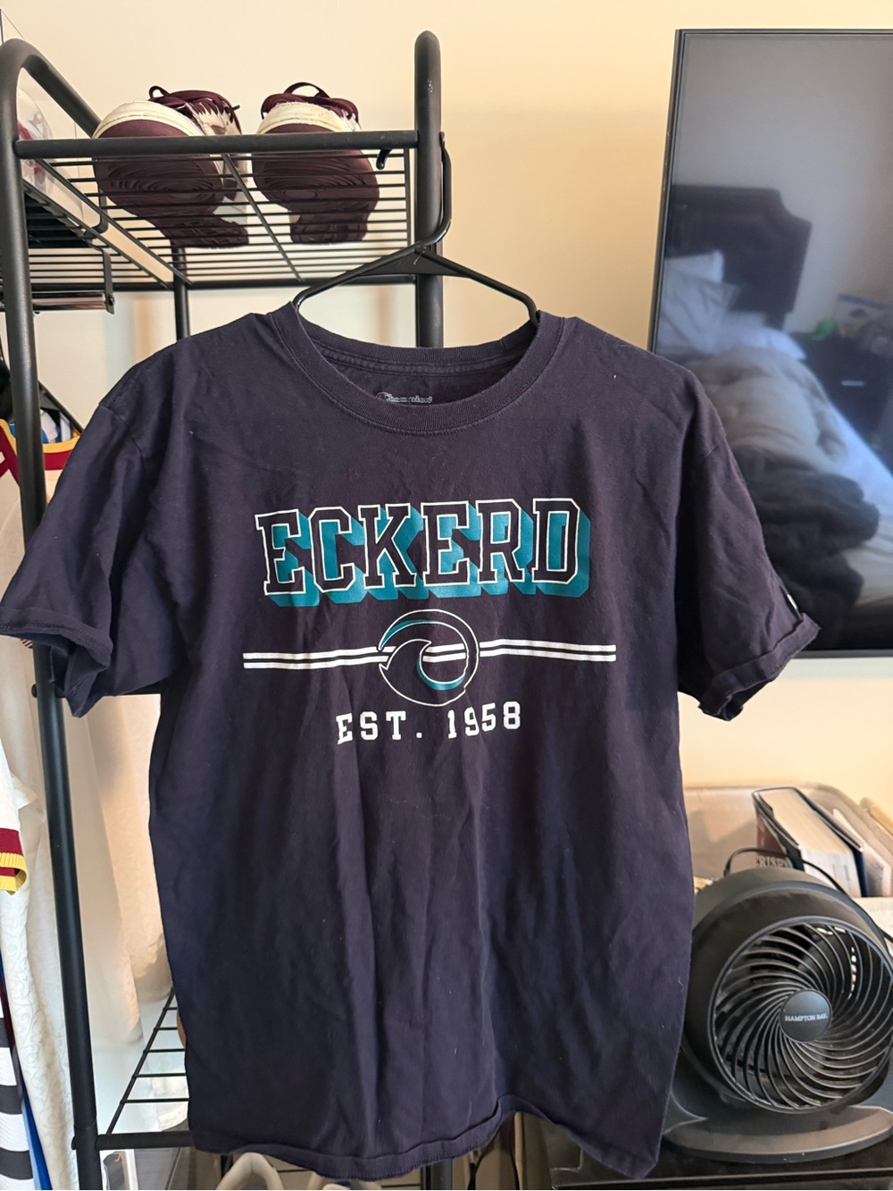 Experts College Champion Navy Short Sleeve Graphic Tee with Teal & White Logo
